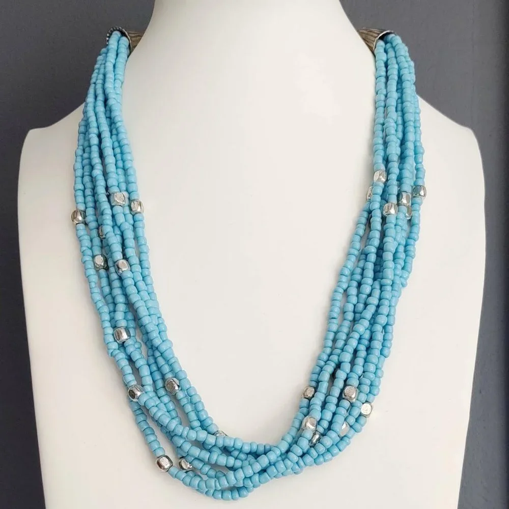 8 strand blue and silver beaded necklace